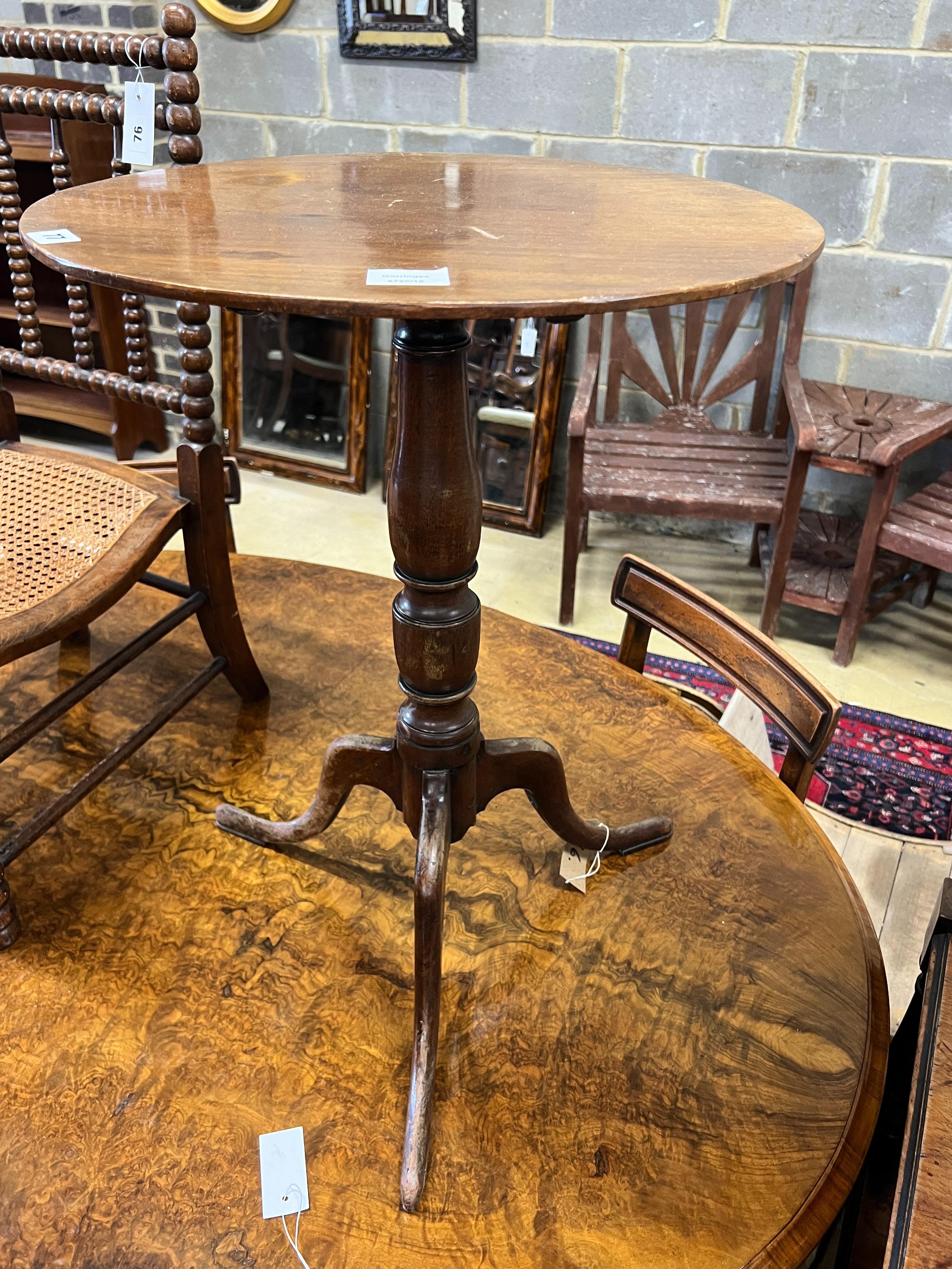 A George III mahogany circular top tripod wine table, diameter 50cm, height 69cm